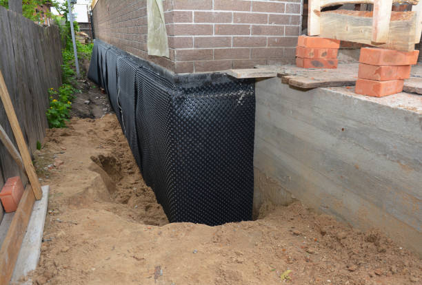 Happy homeowners after waterproofing job in Ferrysburg